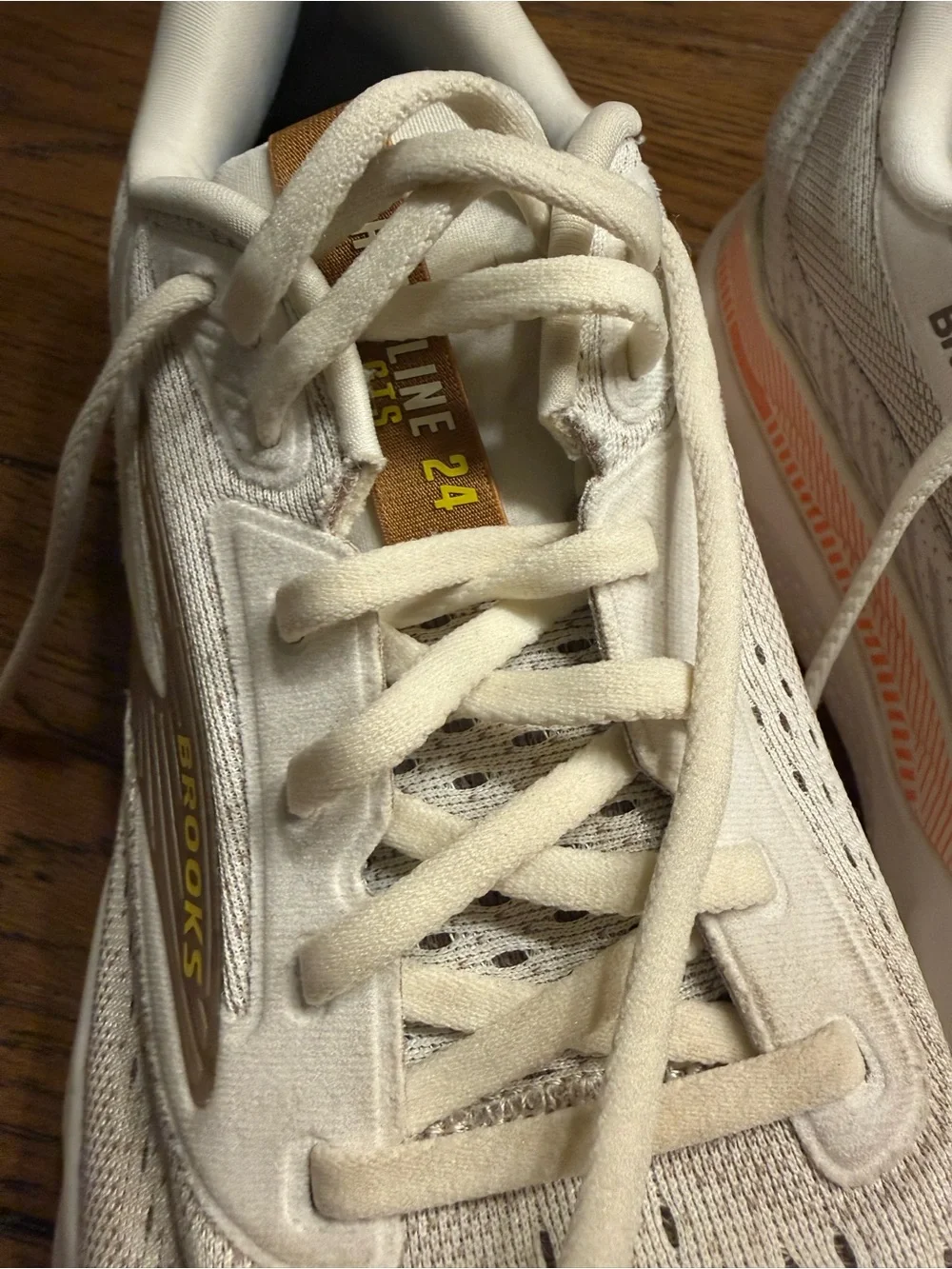 Brooks Men’s Athletic Shoes in Cream with Orange Accents